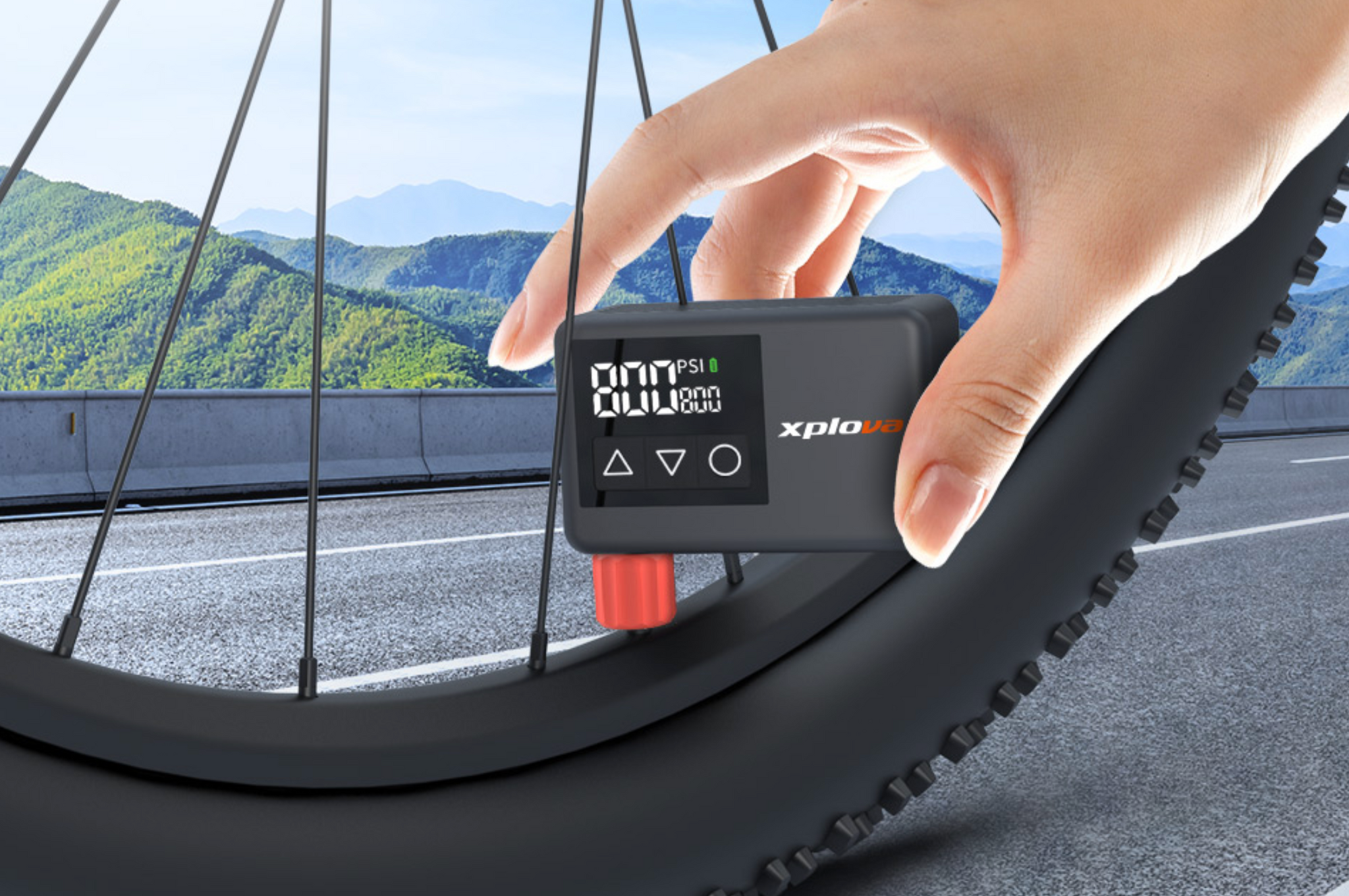 Xplova MP1 Pump Inflating a Road Bike Tyre