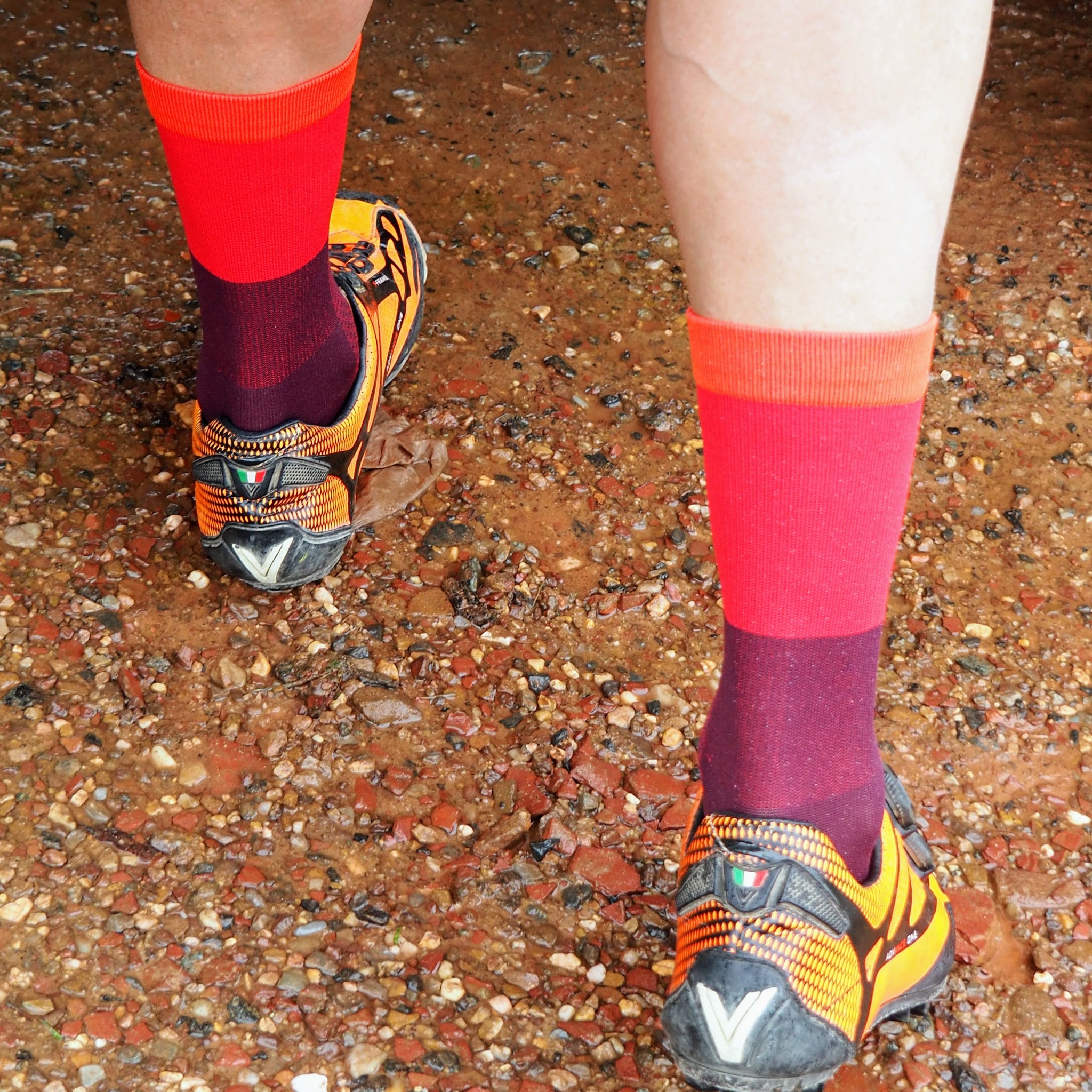 Cyclist wearing Chainsmith red socks