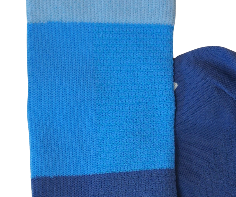 Detail of lightweight mesh panel on blue tri-colour sock upper