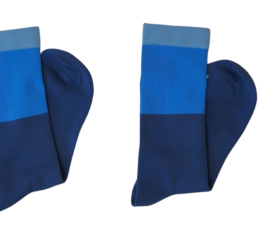 Heel and toe reinforcement on blue cycling socks for gravel durability