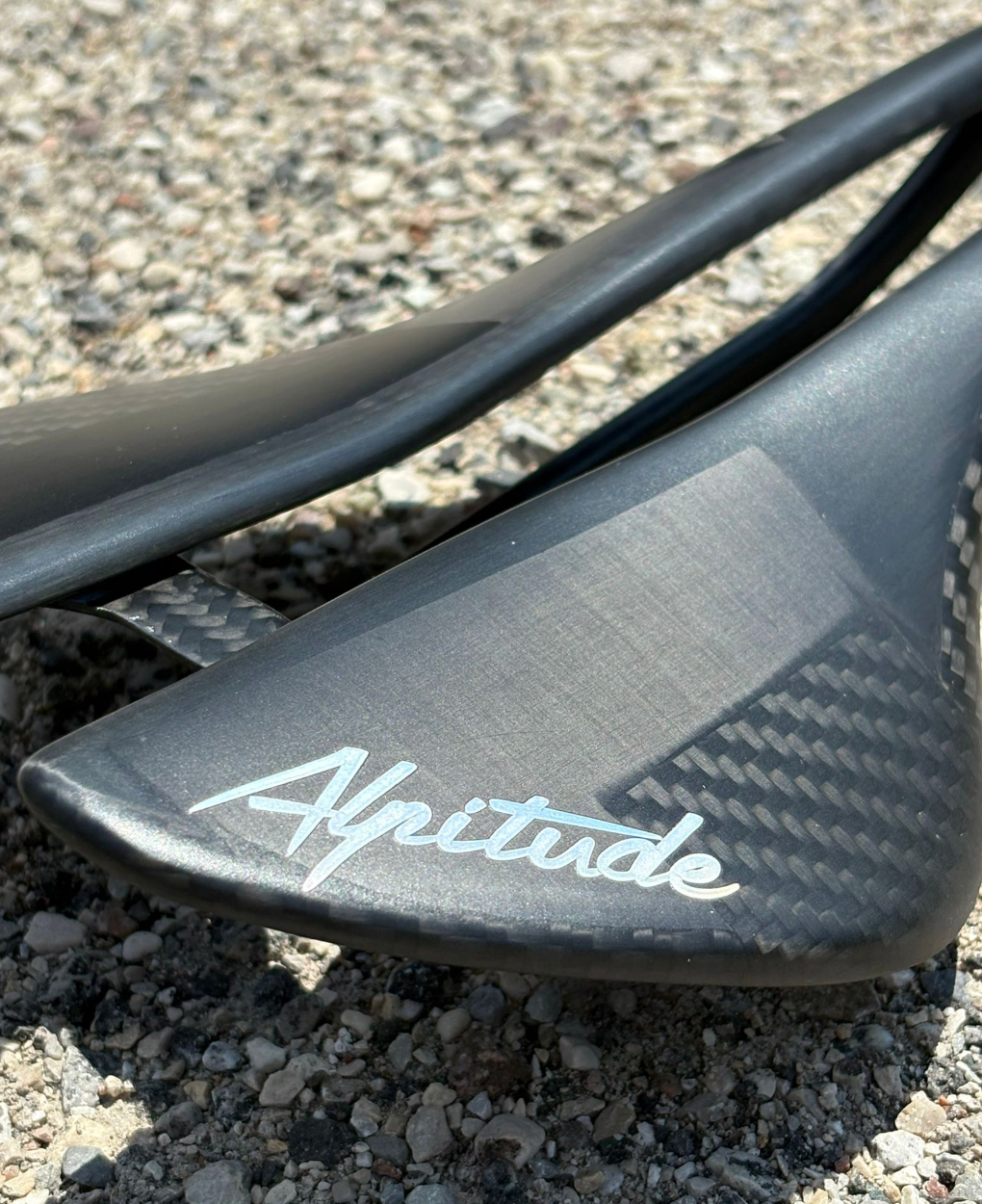 Close-up of handcrafted carbon layup on Alpitude Gardena Giro saddle