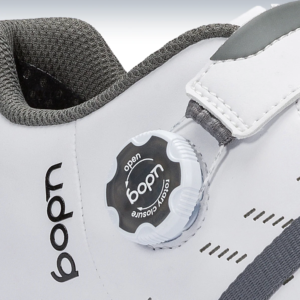 Close-up of Udog Cento Micro Twist dial closure and woven lace system