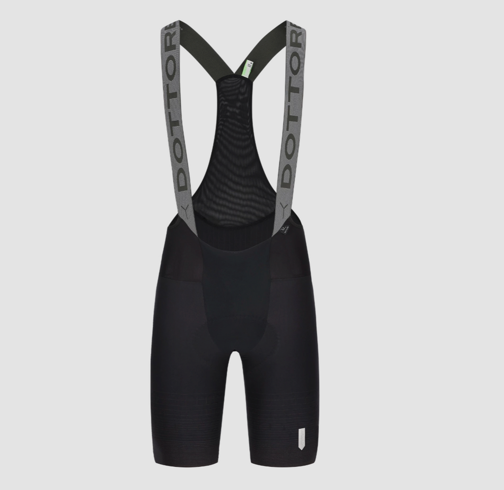 Q36.5 Dottore Pro Bib Shorts – Black, pro-level compression cycling bibs designed for elite performance, muscle support, and aerodynamic efficiency