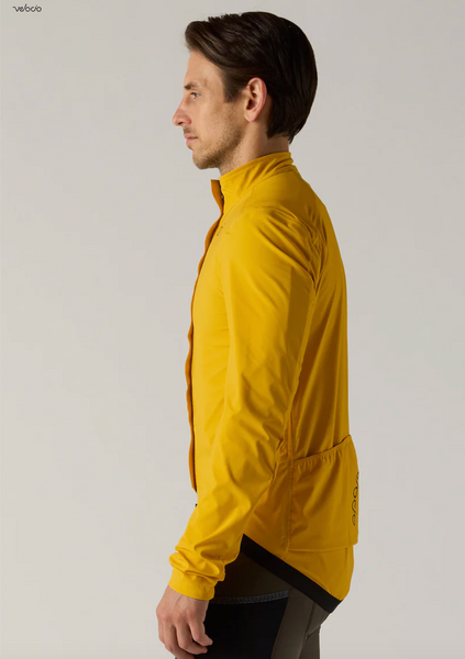 Velocio Men’s ONE Jacket front view showing waterproof cycling shell construction