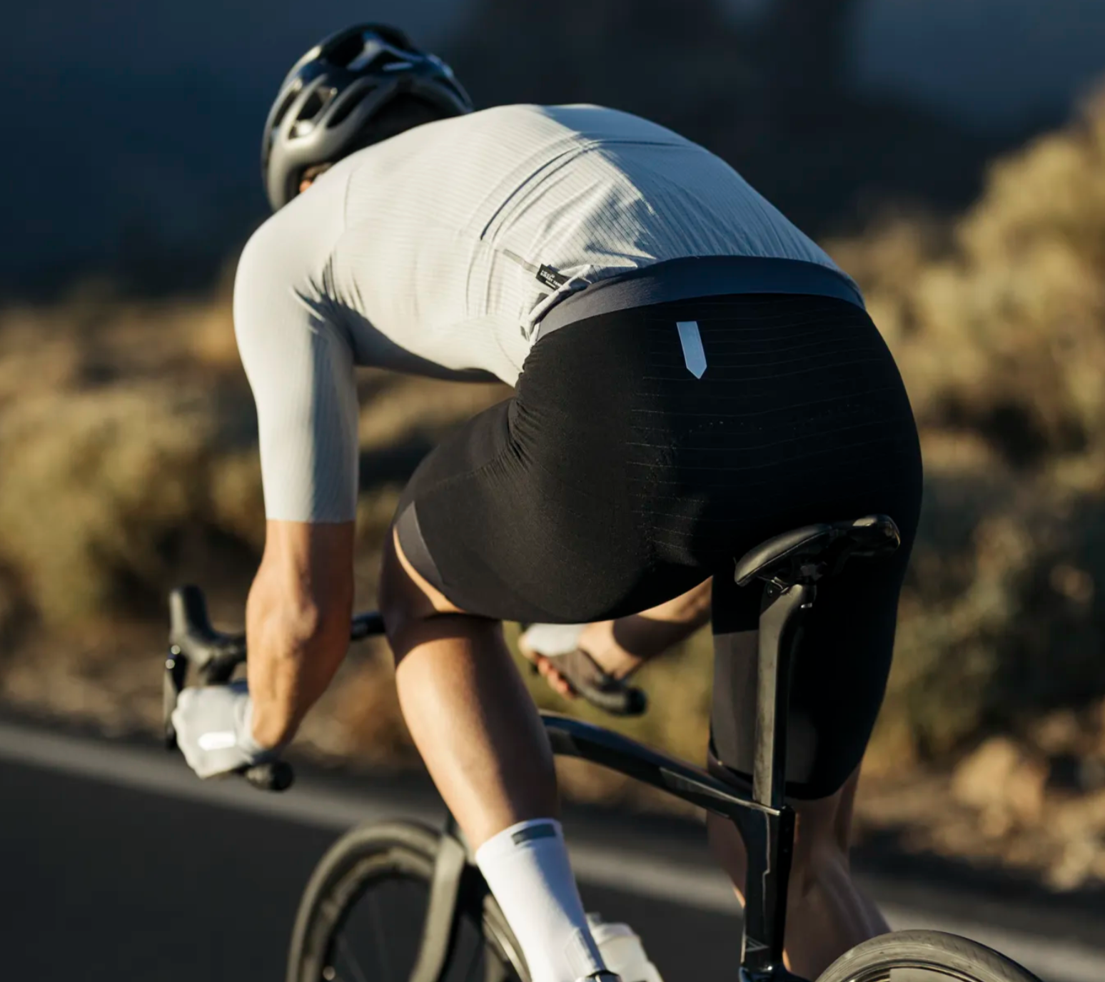 Leg grippers on Q36.5 Unique Pro Bib Shorts – secure fit with high-compression fabric to enhance muscle support and power transfer