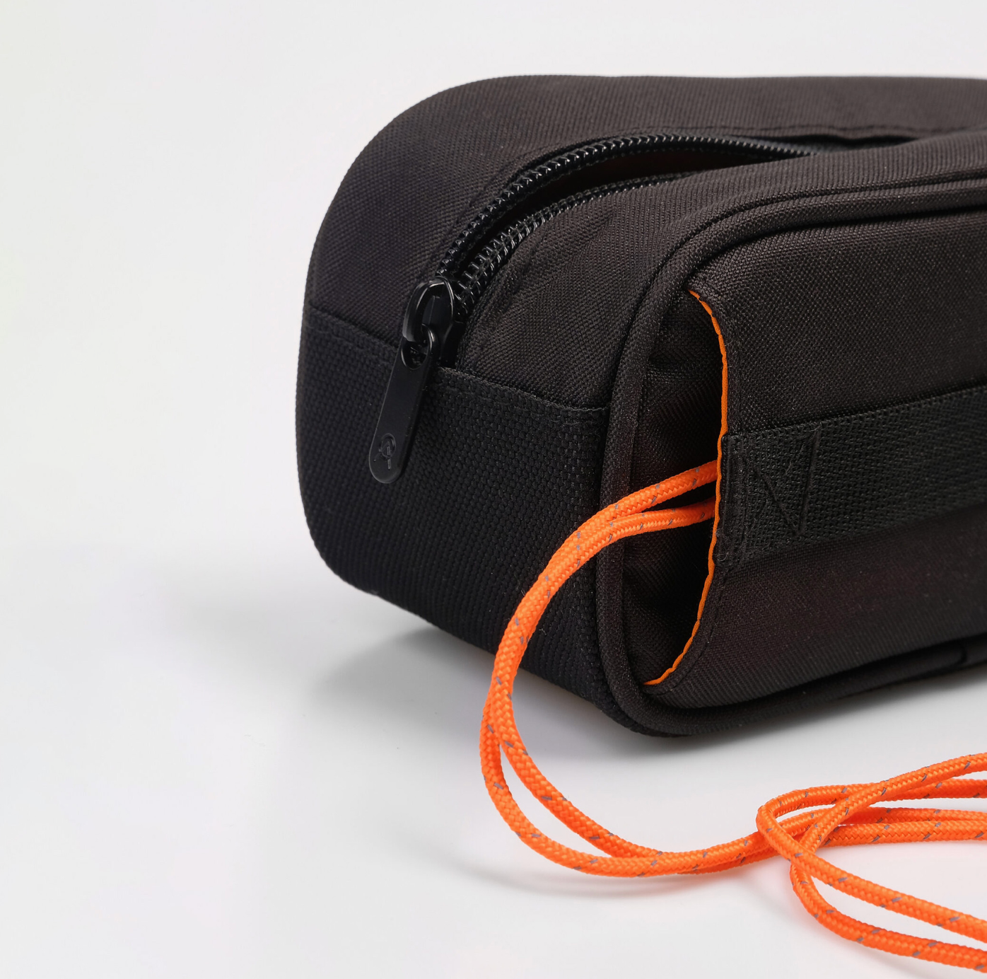 Cyclist’s gear bag packed with Alba Optics Single Case L – perfect travel accessory for eyewear protection