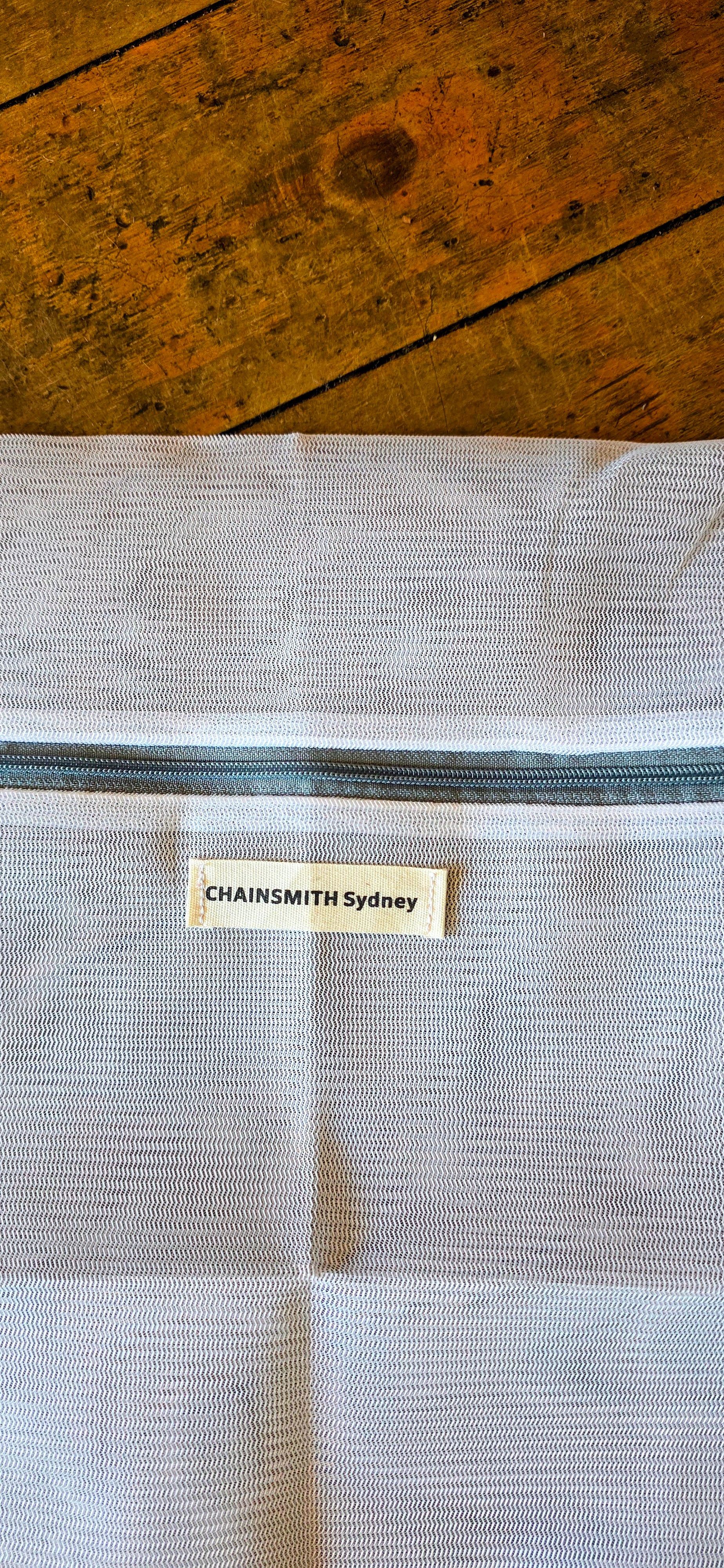 LATEST CHAINSMITH LAUNDRY NET BAG WHITE