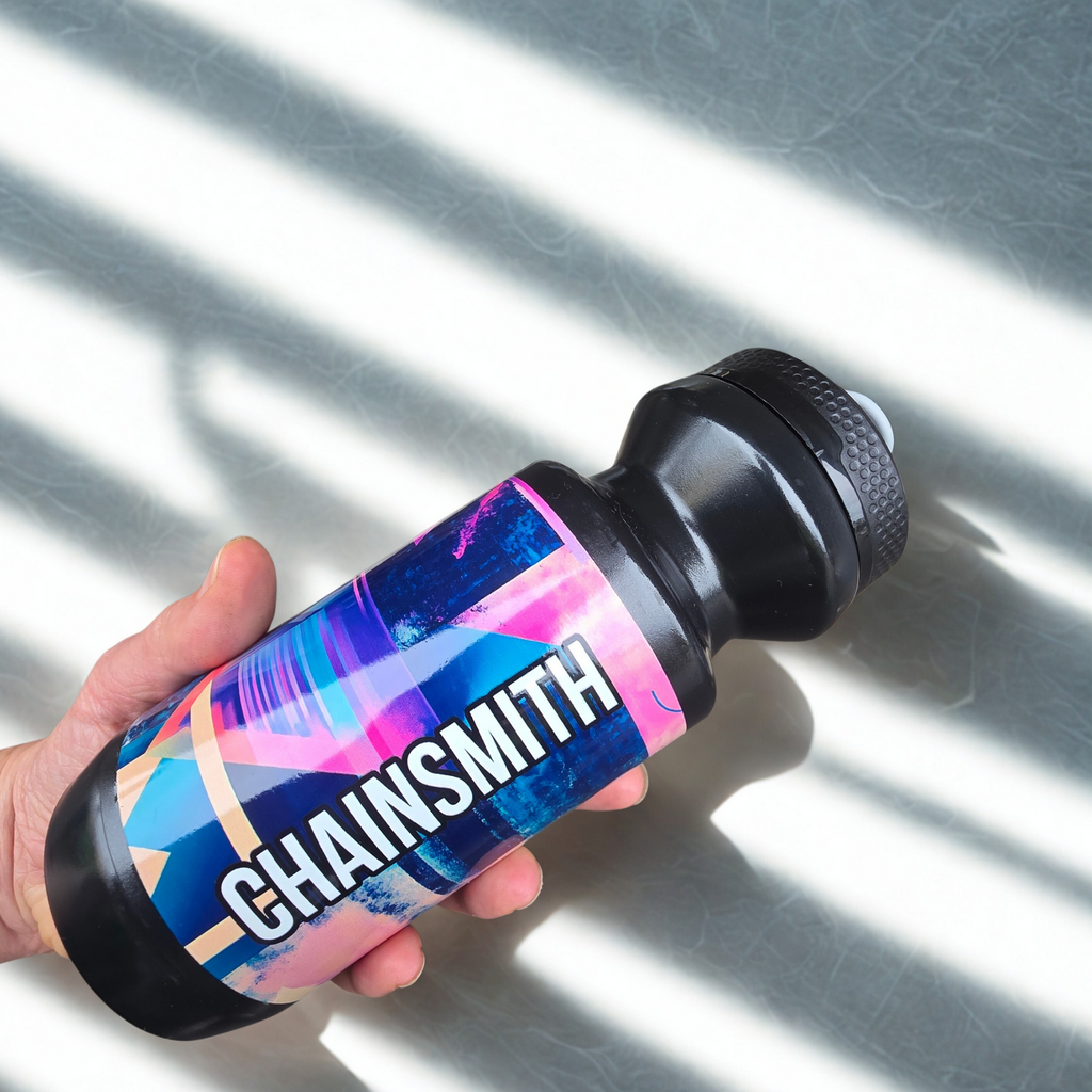Chainsmith 550ml black cycling water bottle with retro 1980s inspired design