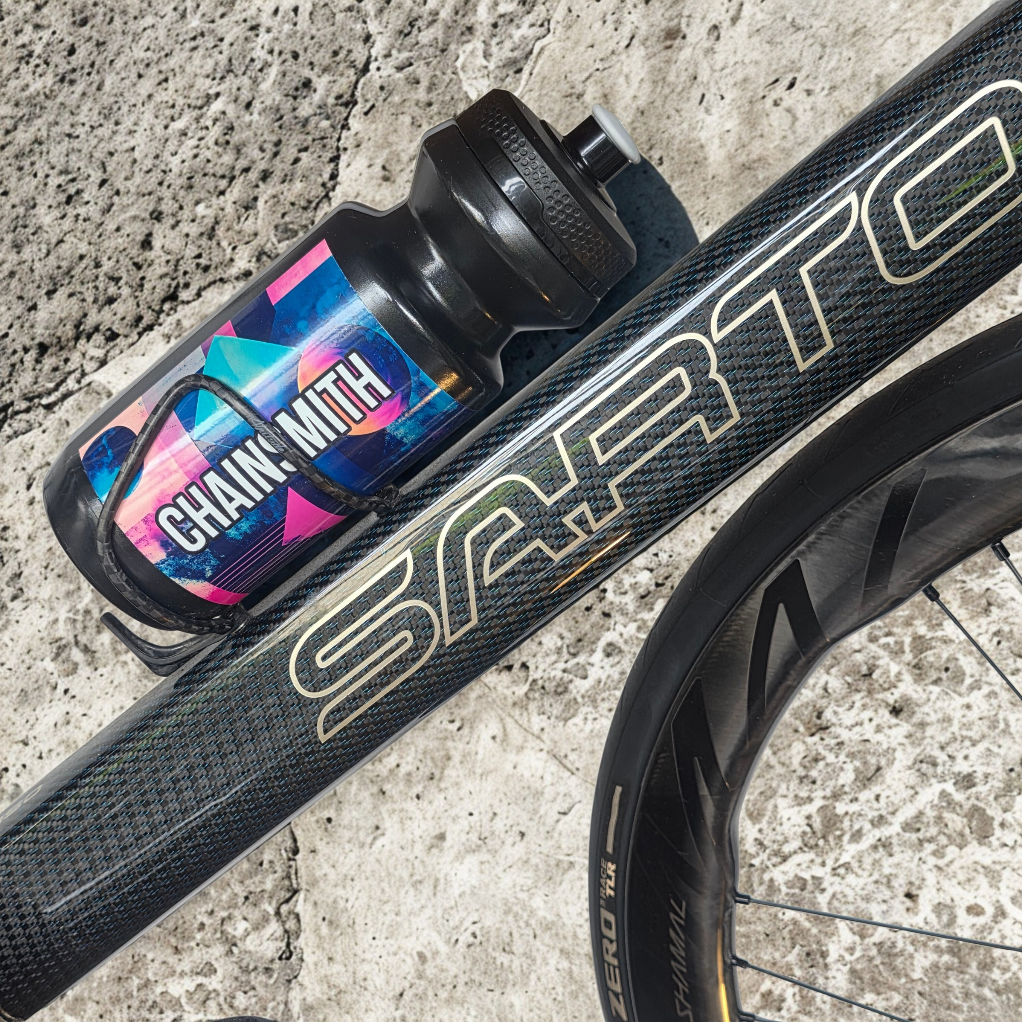 Chainsmith 550ml bottle fitted to sarto road bike frame bottle cage